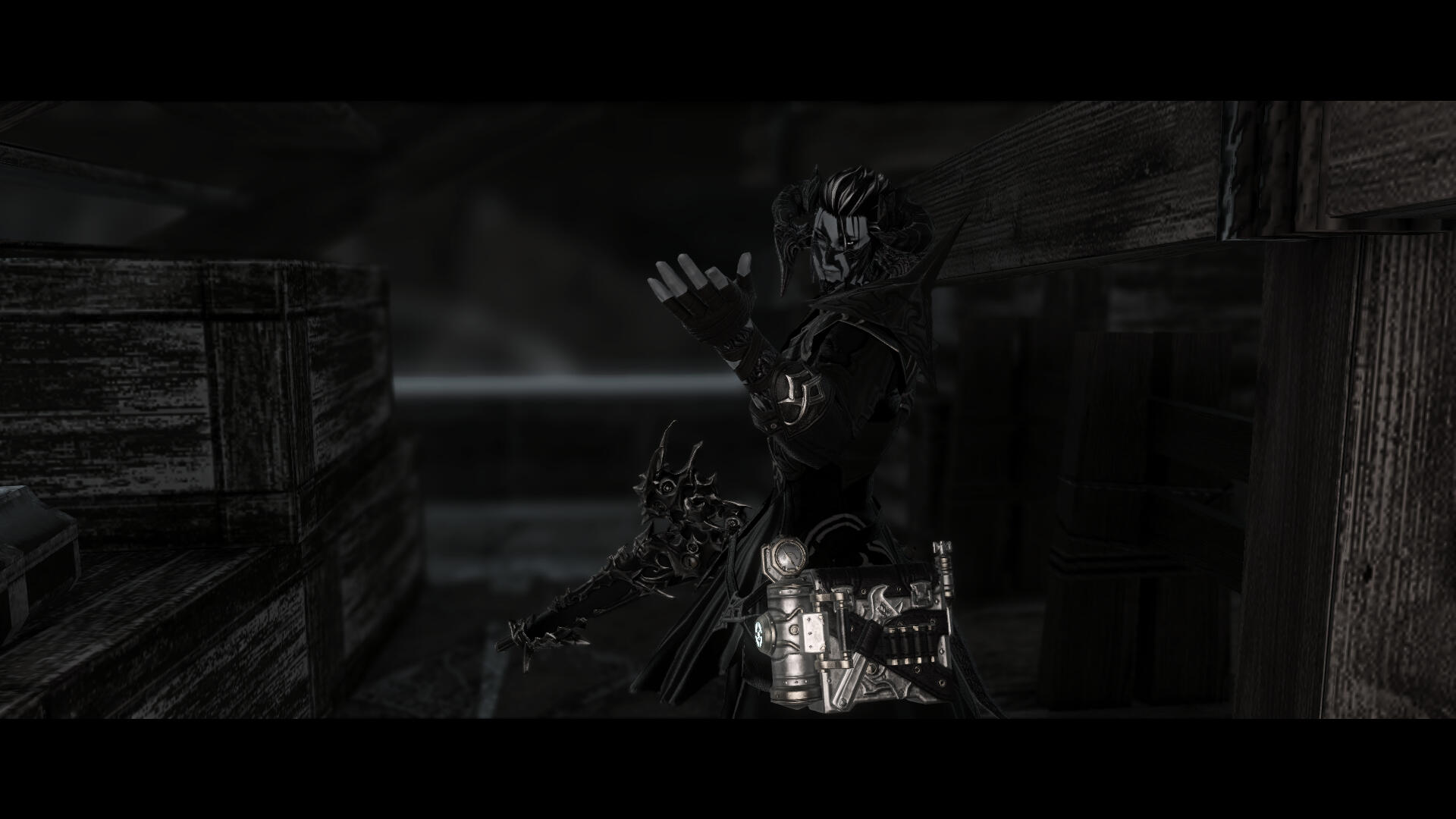 A de-saturated, cinematic image of a Xaelan man with black hair streaked with white, and black war paint across his eyes. He's wearing dark armor with a spiked shoulder plate and his hand is outstretched, palm up. In the opposite hand, he holds a large gun